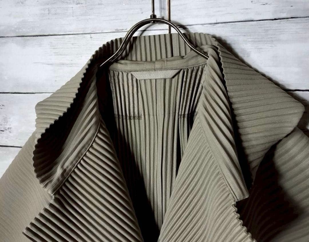 オムプリッセイッセイミヤケ フーディ ポンチョカーディガン マント ミドル丈