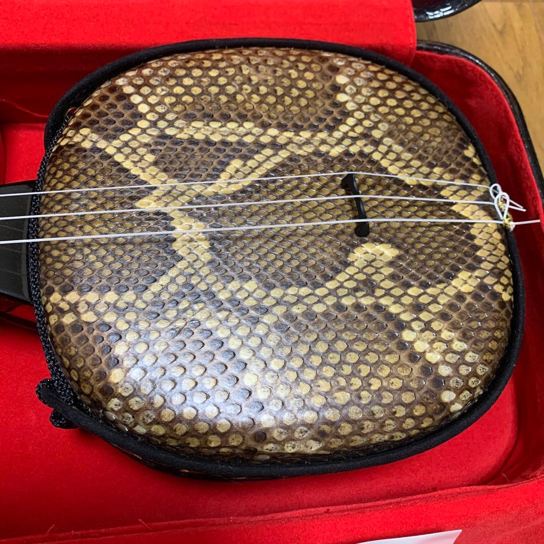 沖縄 三線 本蛇皮 強化張りハードケース付き