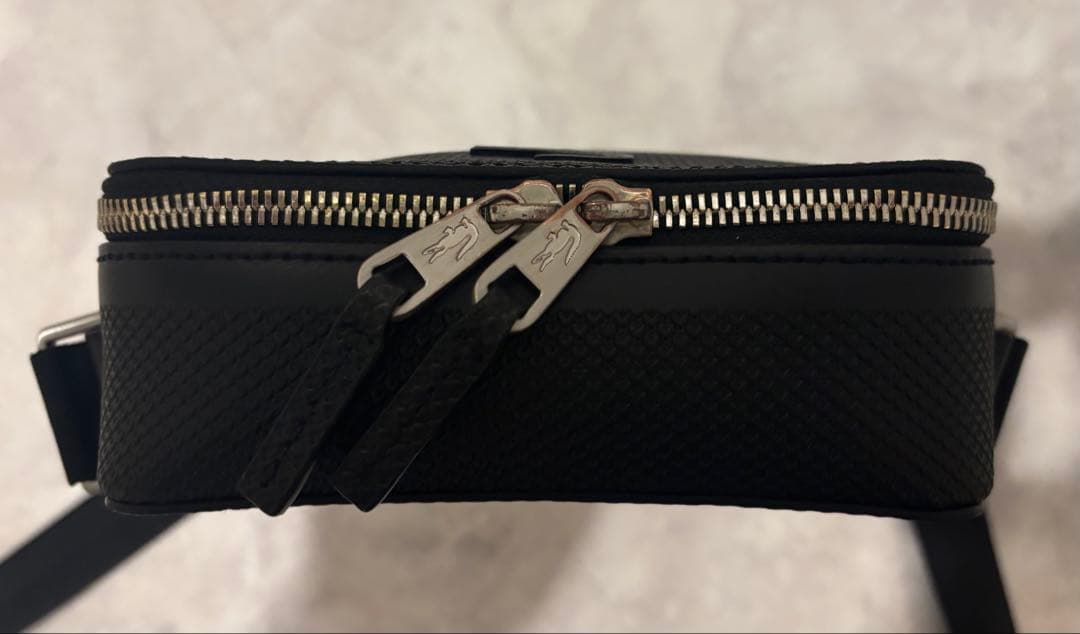 ラコステ CHANTACO バーティカルカメラバッグ