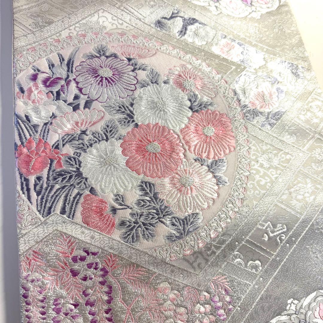 5k2780 袋帯　絹　唐織　プラチナ箔　正倉院文様　華文　銀色　白　ピンク　紫