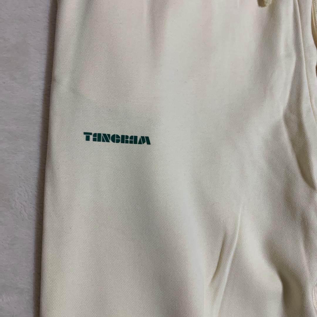 TANGRAM クリーム色パンツ
