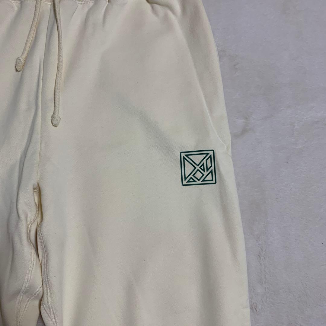 TANGRAM クリーム色パンツ