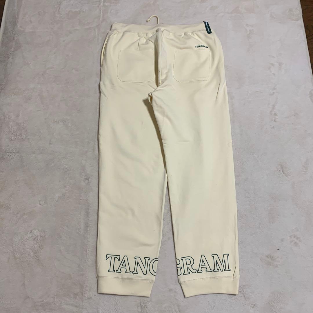 TANGRAM クリーム色パンツ