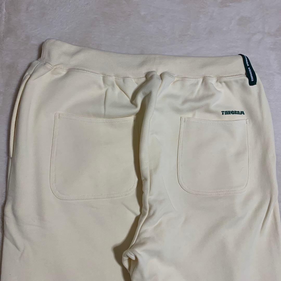 TANGRAM クリーム色パンツ