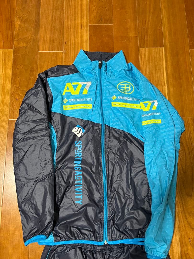 ASICS ウィンドブレーカー 青/黒