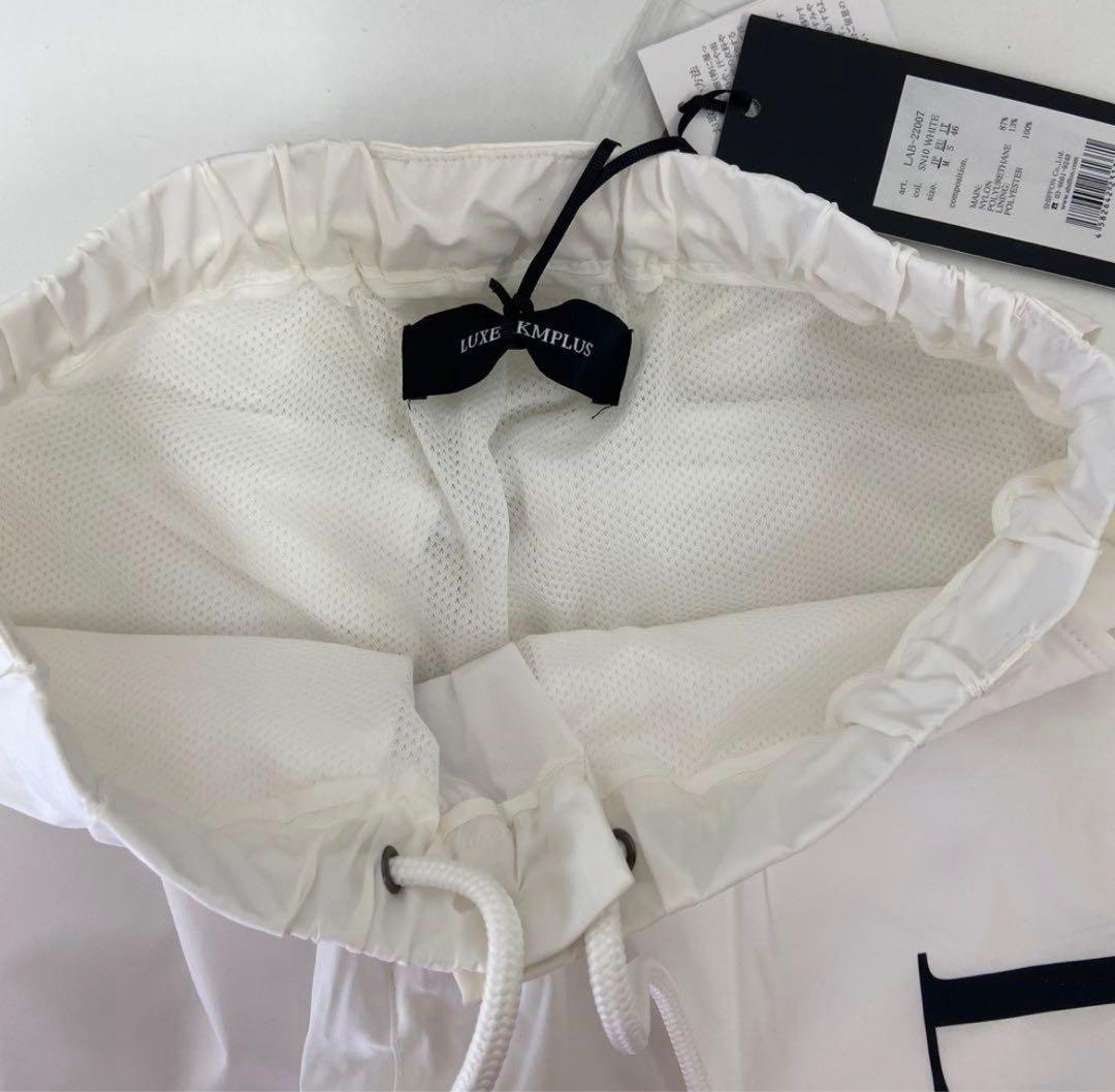 リュクスエイケイエムプラス ゴルフ 防風 サークルロゴウィンドウパンツ＆ウェア