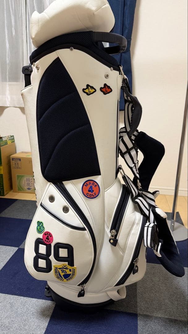 パーリーゲイツ・ワッペンスマイリー スタンドバッグ【WEB限定モデル】