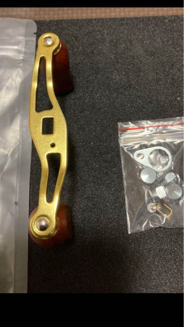 ダイワ　ミリオネア　gs-2000C 新品ウッドハンドルノブカスタム