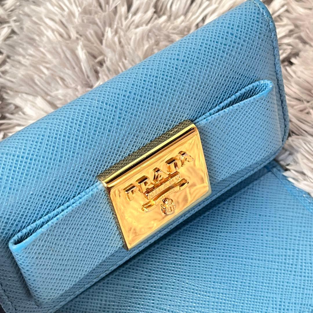 美品✨PRADA キーケース6連　ゴールドロゴ　サフィアーノ　水色