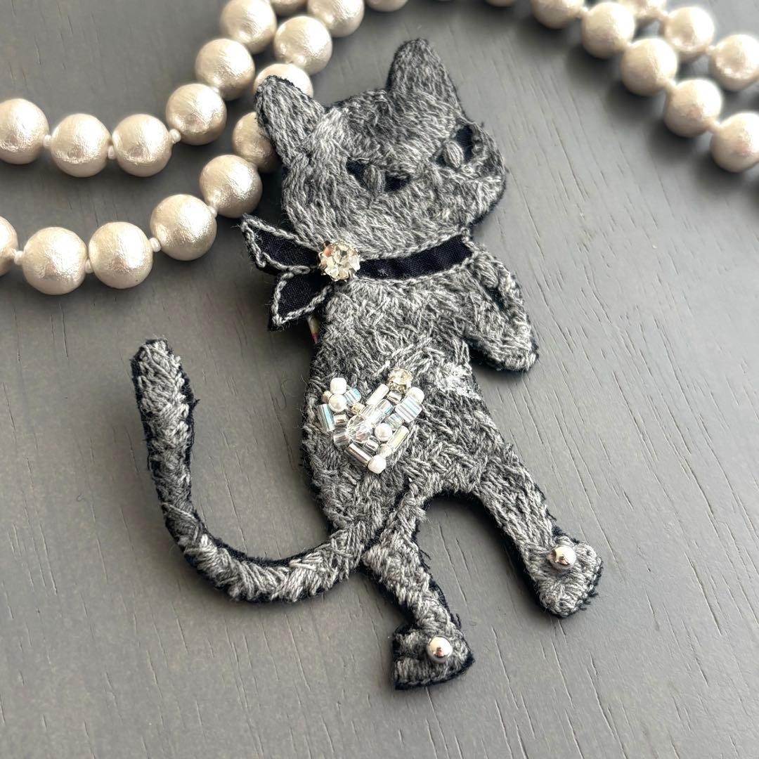 ①55 pjc ブローチアクセサリー ミナペルホネン 猫 クロッチ君ファンの