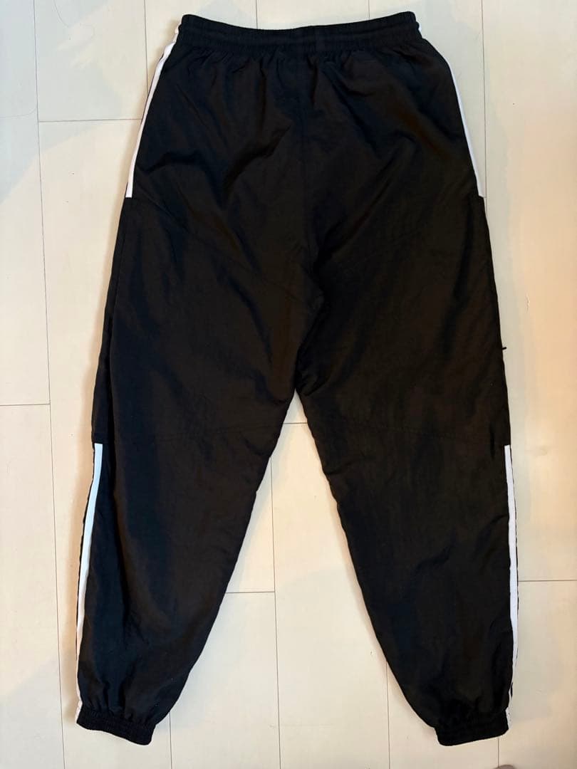 adidas アディカラークラシックス Disrupted アイコンセットアップ