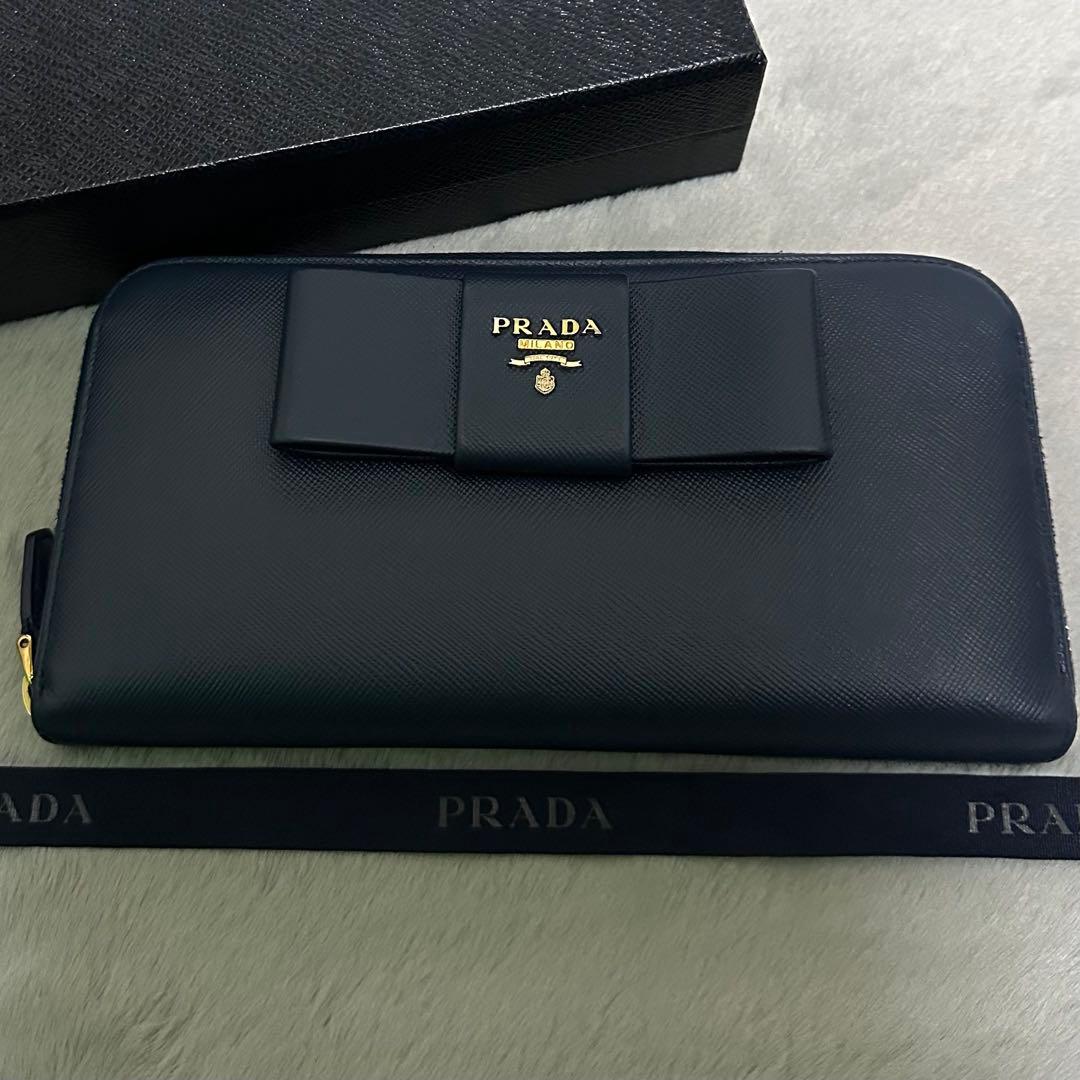 PRADA プラダ 長財布 リボン ラウンドファスナー ブルー ゴールドロゴ