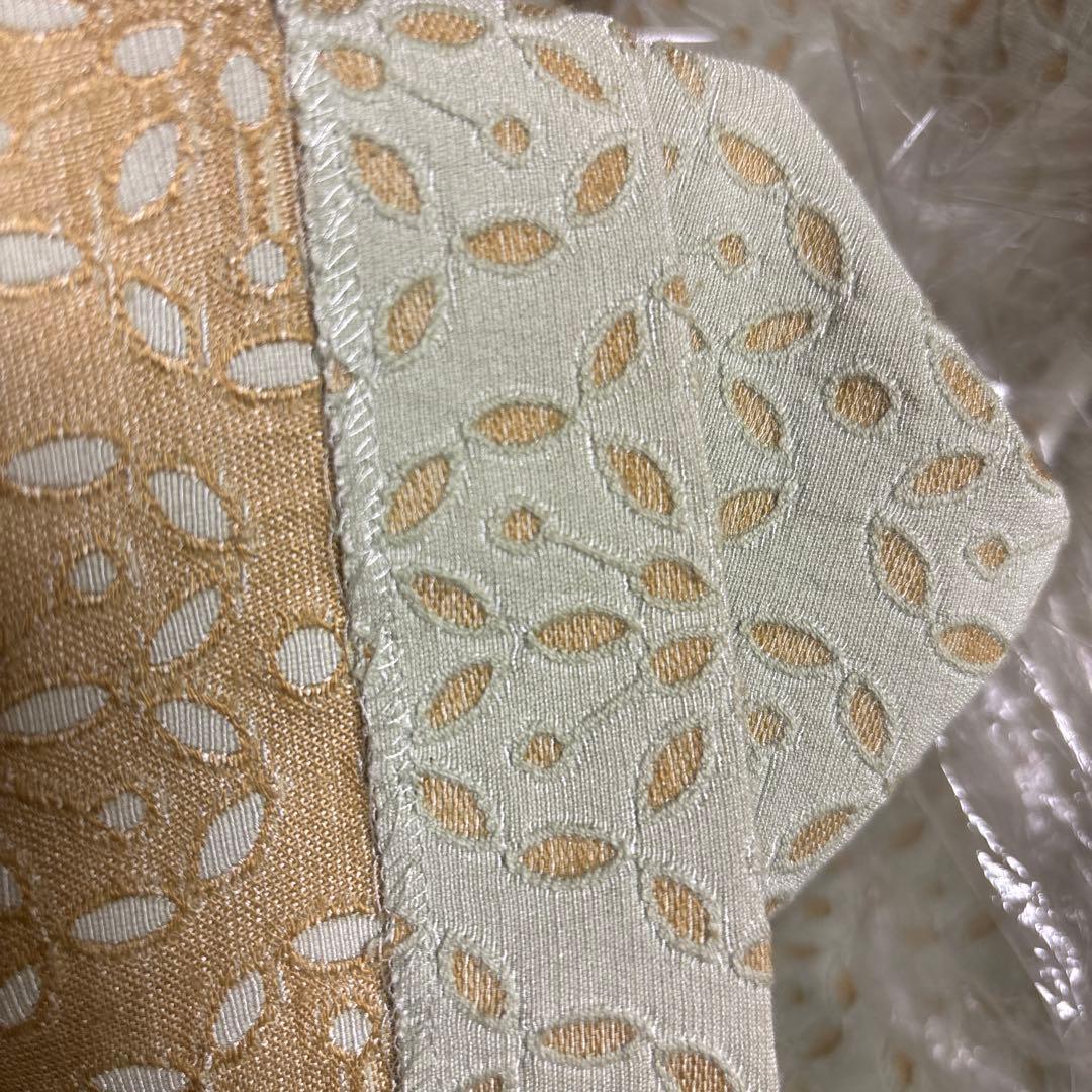 シビラ 薄い緑色のフォーマルスーツ