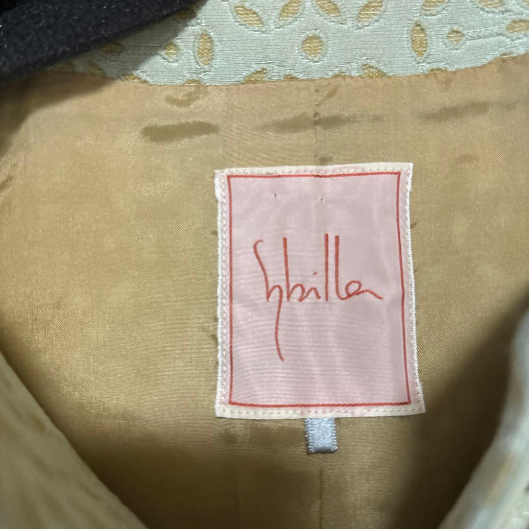 シビラ 薄い緑色のフォーマルスーツ