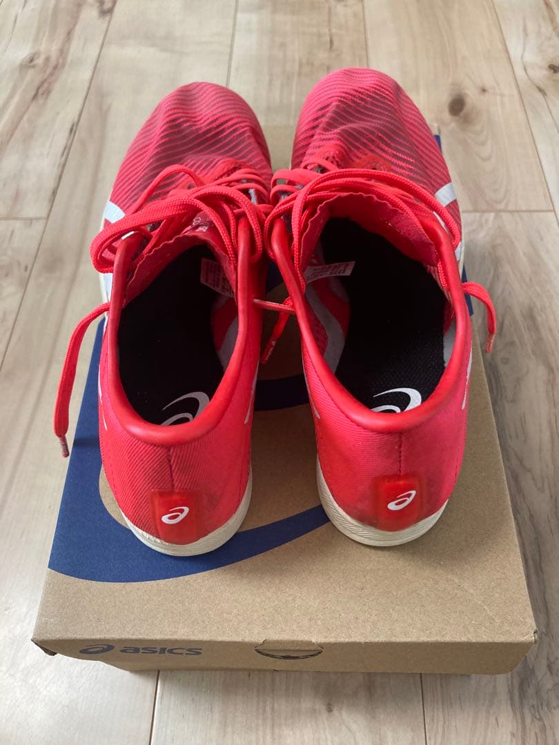 ASICS スパイクシューズ レッド