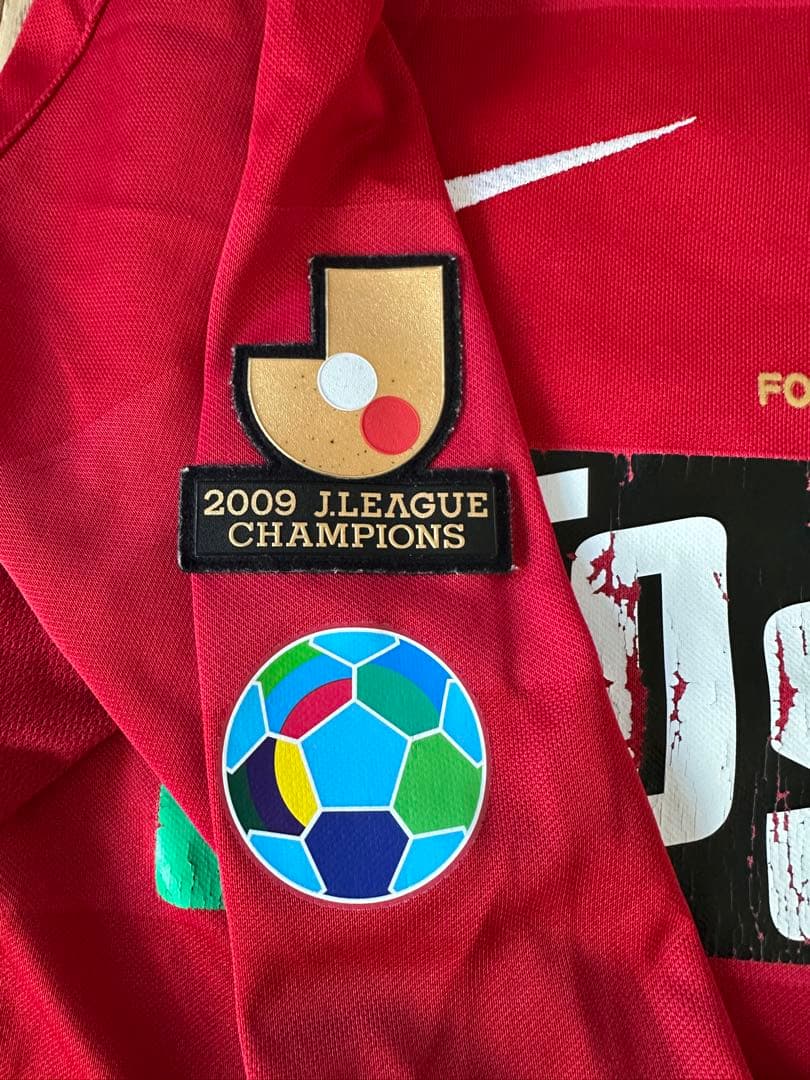 鹿島アントラーズ NIKE 2010ホーム長袖ユニフォームリーグ優勝ワッペン付