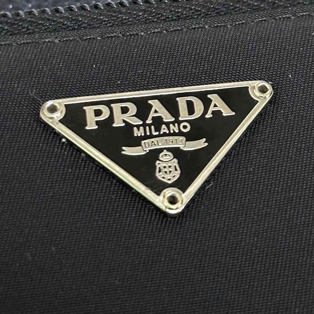 PRADA プラダ 折り財布 ラウンドファスナー ナイロン 三角ロゴ - メルカリ