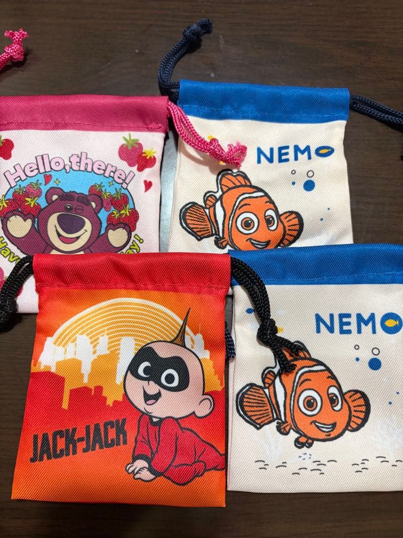 ディズニー・ピクサー ミニ巾着 seria ランダム - メルカリ