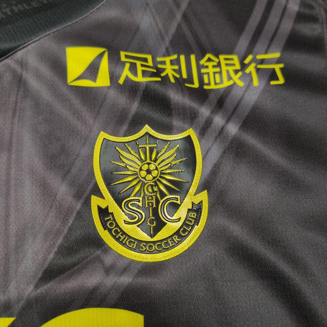 栃木SC ATHLETA 半袖シャツ 黒/黄色