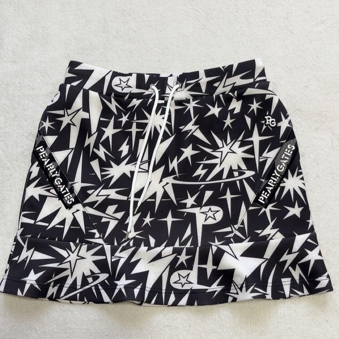 美品　2024 パーリーゲイツ　セットアップ　ギザ星柄　スカート　パーカー　L