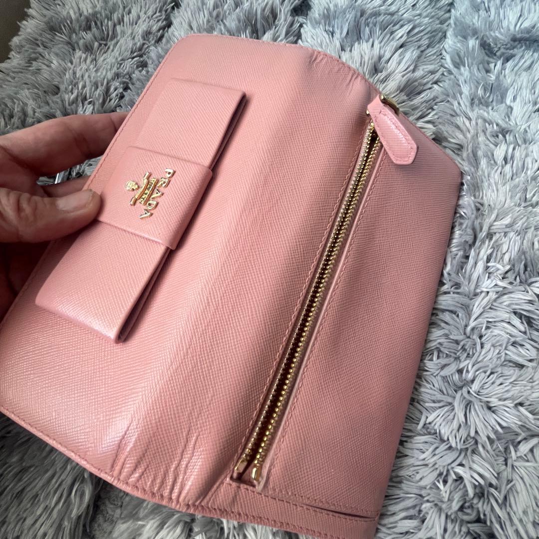 PRADA フィオッコ サフィアーノ 長財布 リボン ピンク メタルロゴ